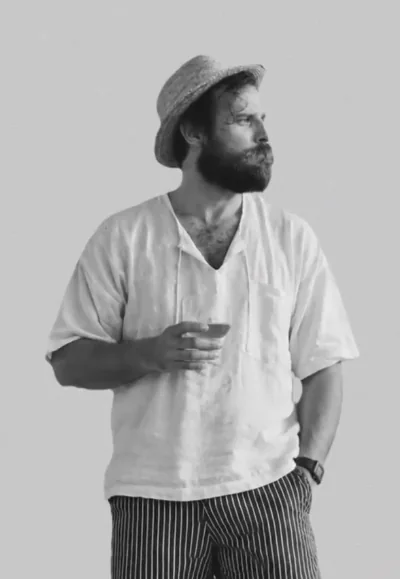 One of Godspeed’s co-founders, wearing a hat